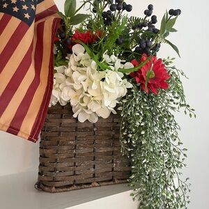 Rustic Brown Woven Basket with Red and White Floral Arrangement